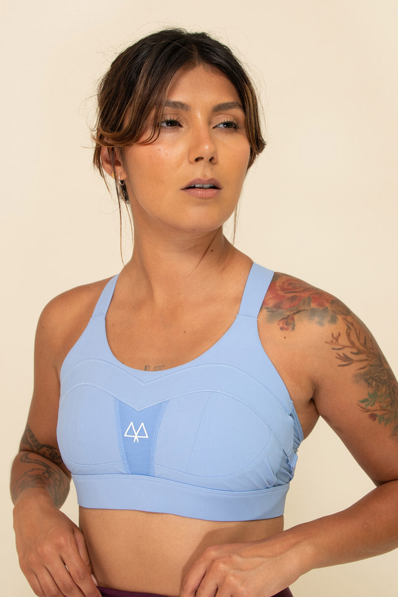 Sports bra with crossed straps in cornflower blue for girls and women